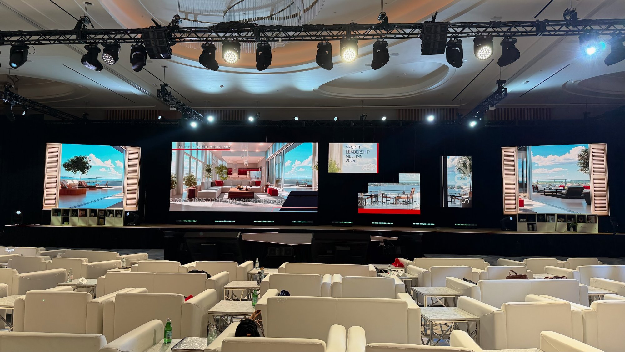 Showbox corporate set design and AV production at Conrad Orlando — custom office set build with multi-screen video display